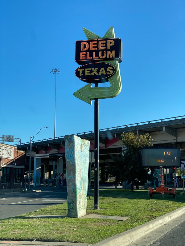 A neon sign in Deep Ellum, TX