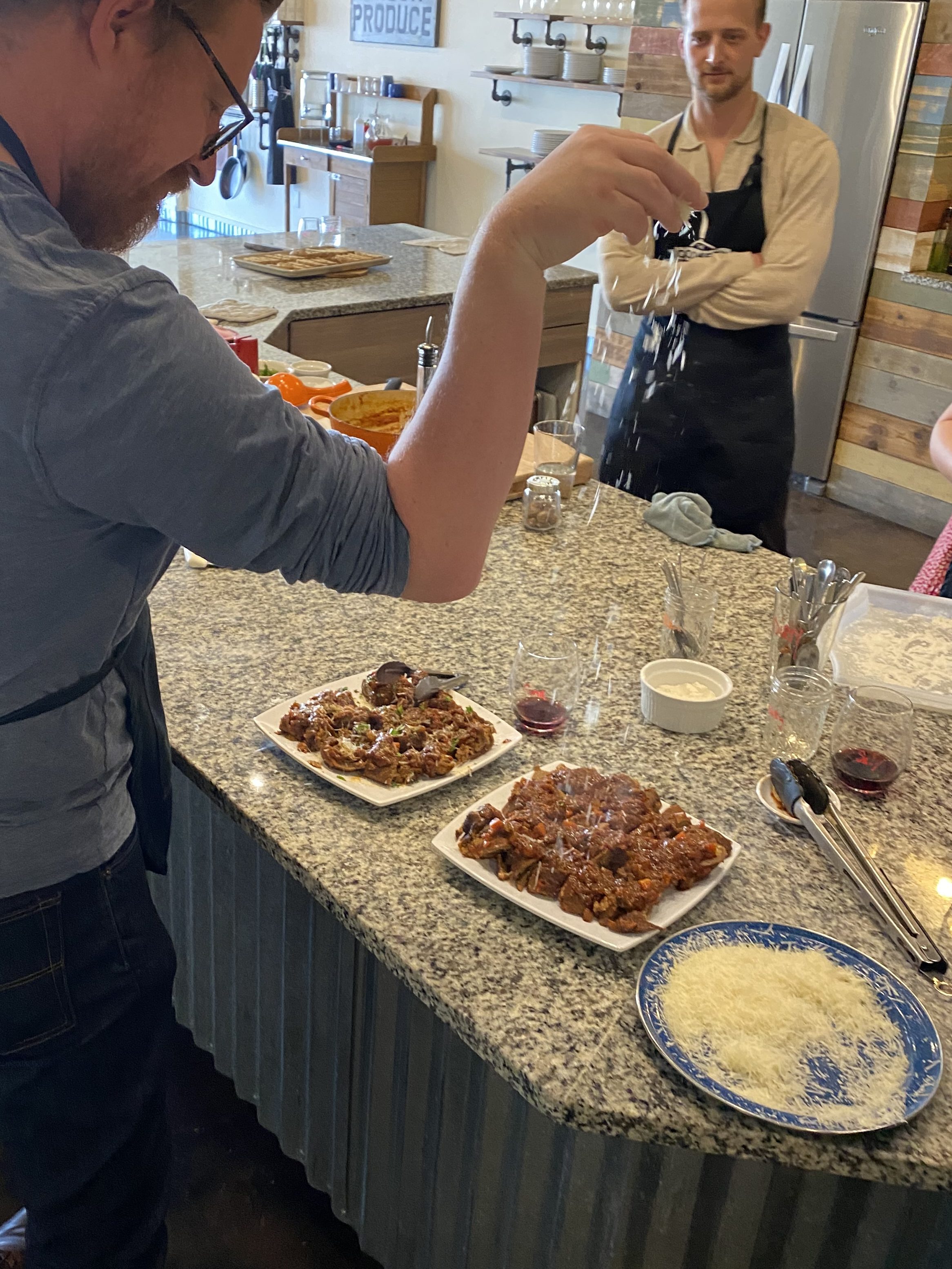 Getting crafty in the kitchen with a little "salt bae" treatment after learning how to cook at The Cookery Dallas